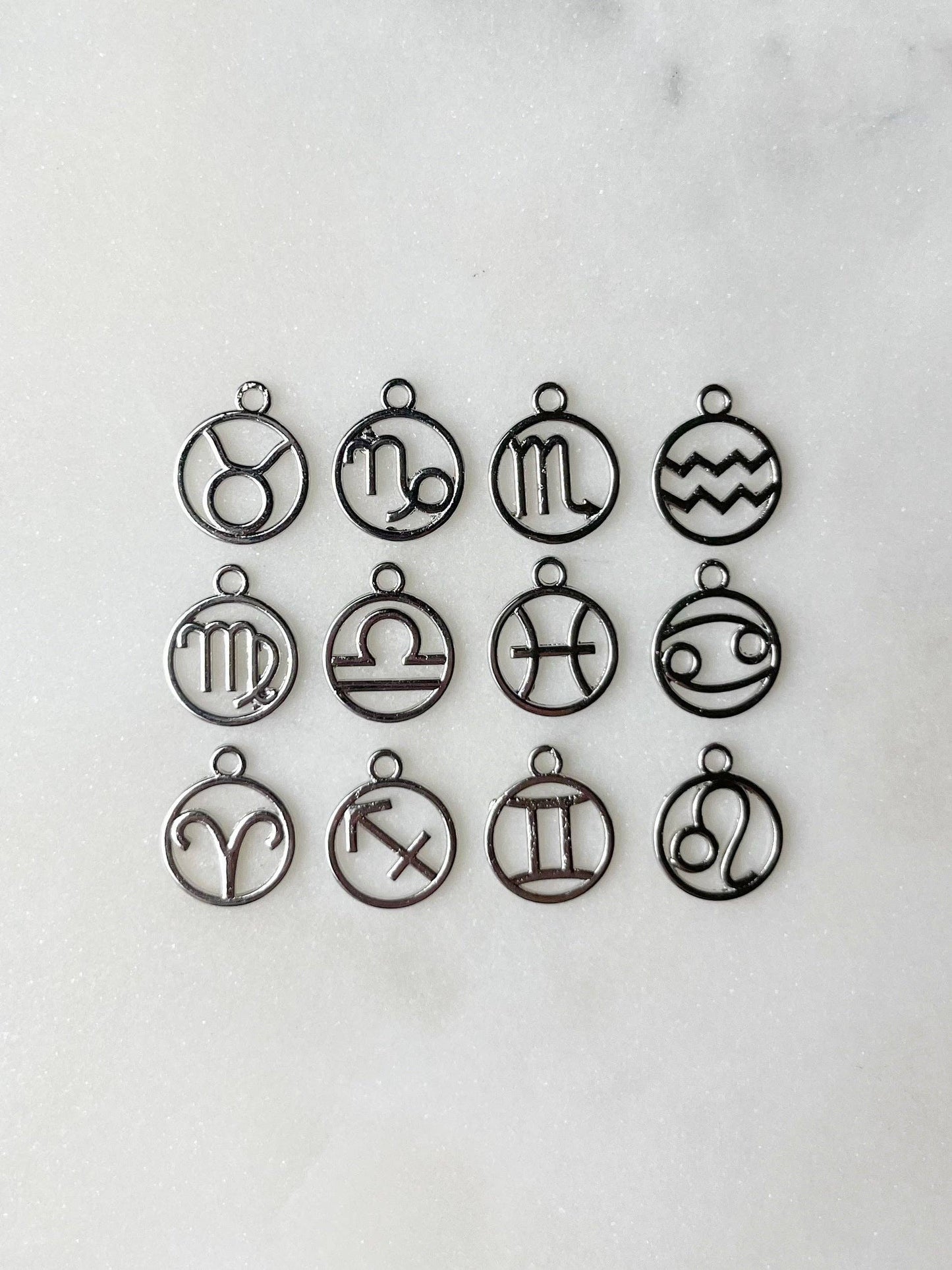 ZODIAC SILVER CHARM